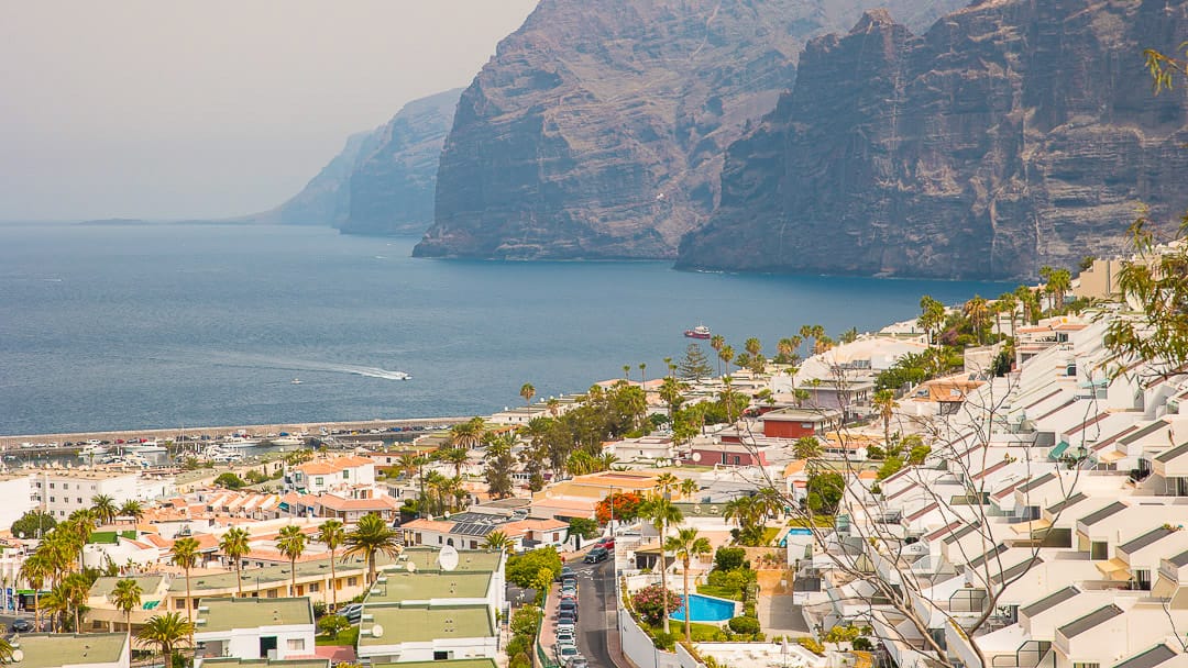 Coastal view over a seaside town in Tenerife with cliffs and Atlantic Ocean