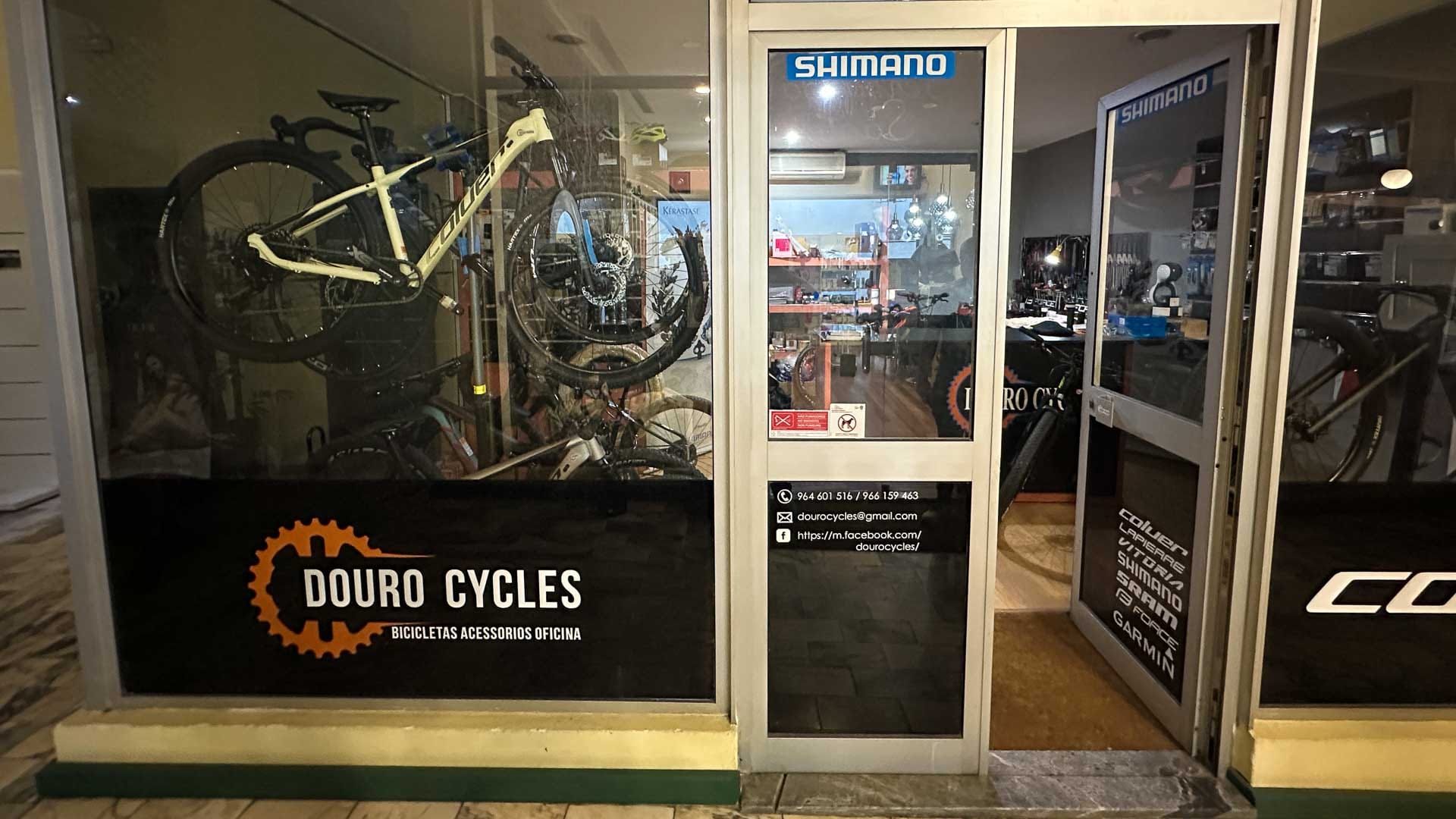 Exterior view of the Douro Cycles bike shop with bikes displayed outside in Portugal