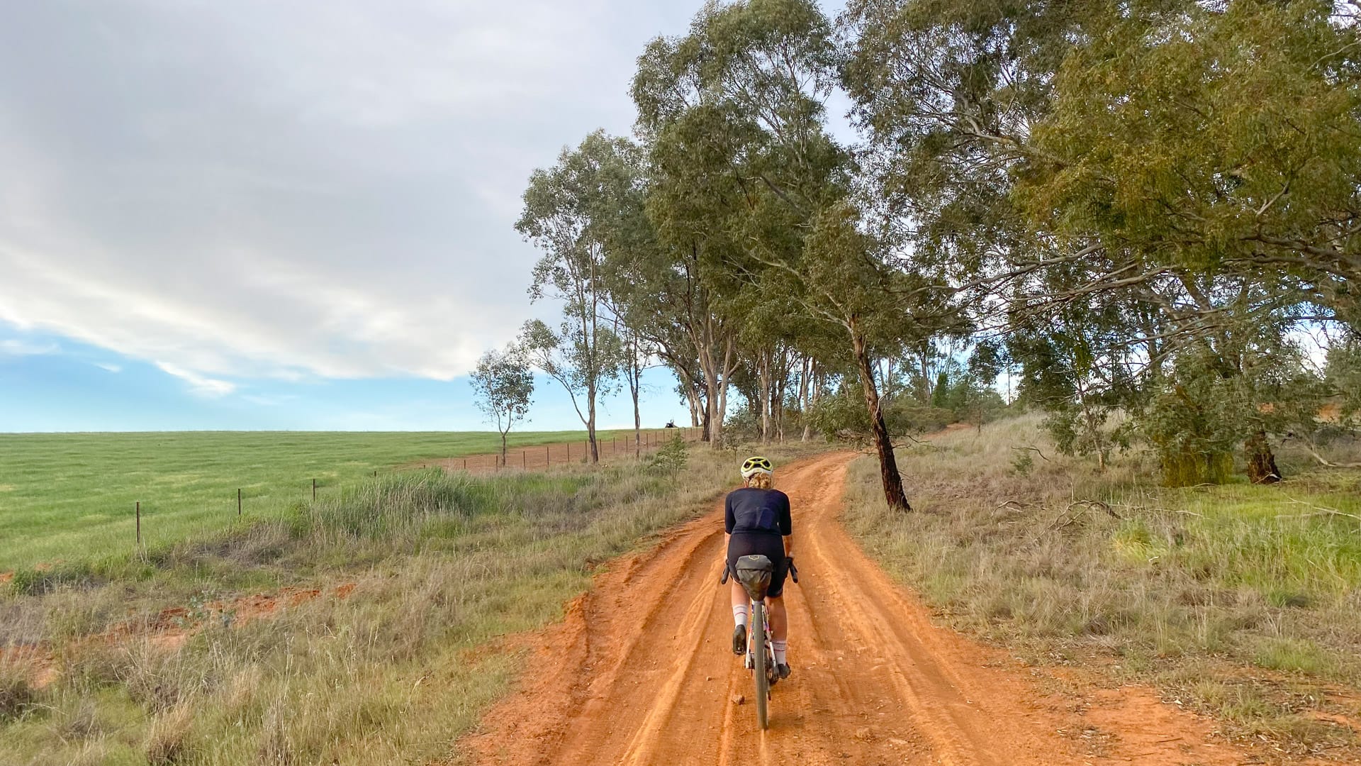 Cyclist tackling the classic Australian red dirt