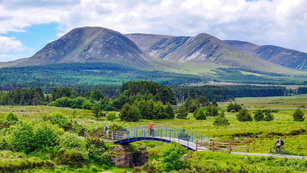 Cyclist riding the Great Western Greenway, County Mayo, Ireland
