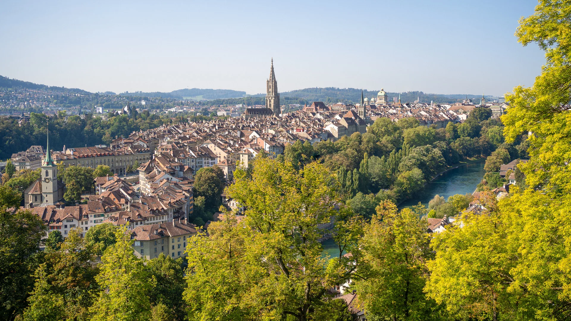 View over Bern Old Town from the Rosengarten viewpoint with historic rooftops and the Aare River