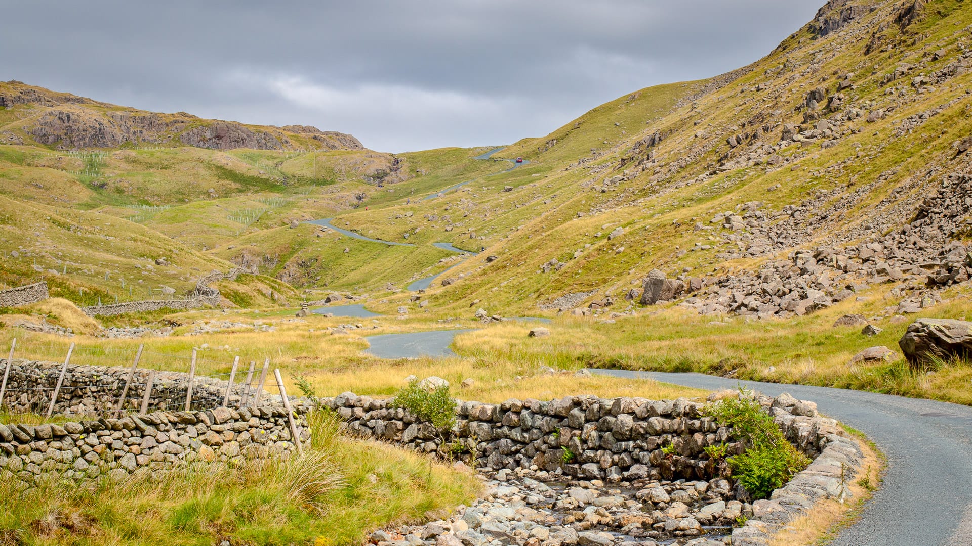 Stunning scenic view towards Wrynose Pass in Cumbria, Lake District National Park. One of the highest mountain passes in England