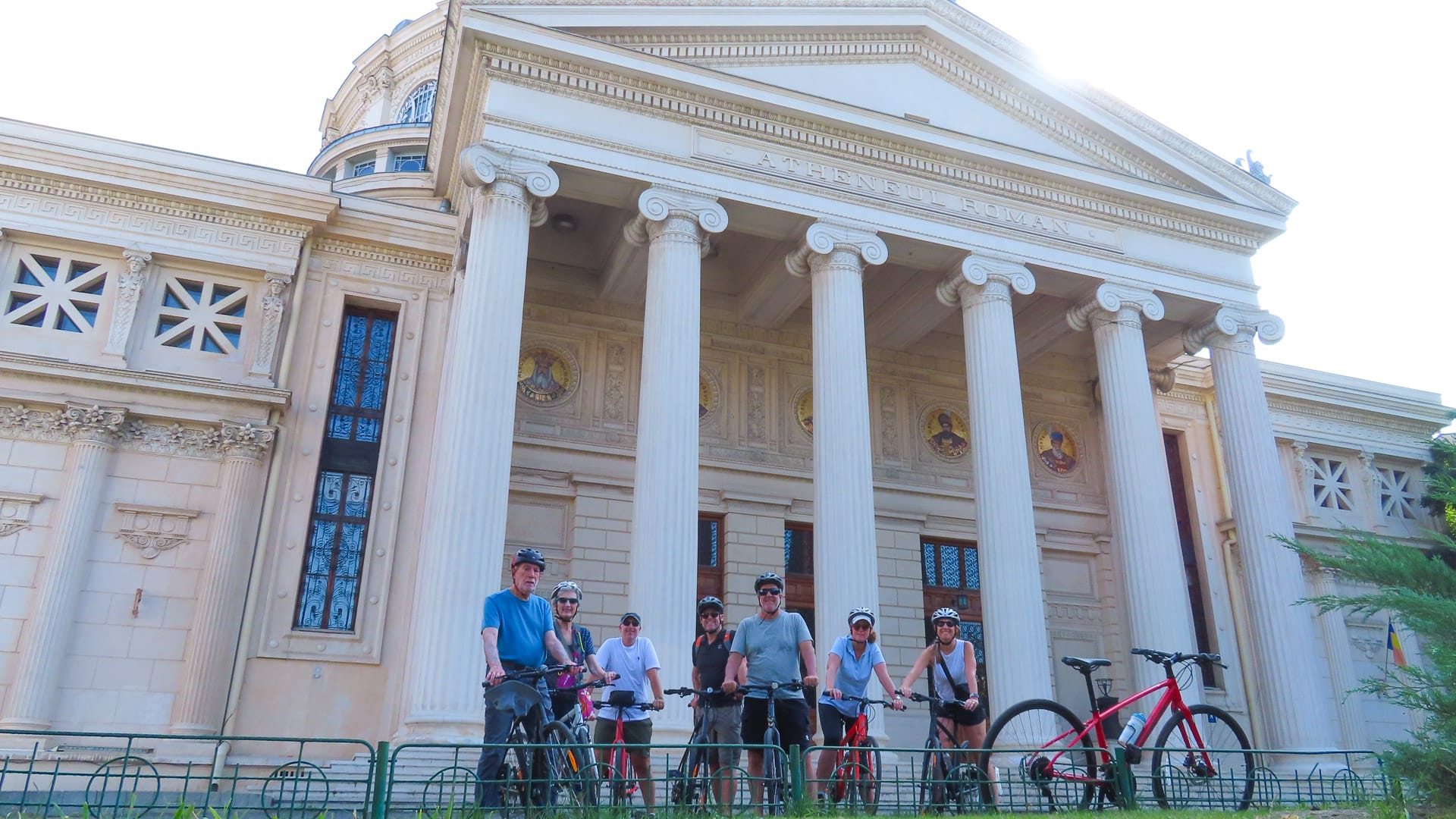 Group on a Bike in Time guided tour riding through Bucharest