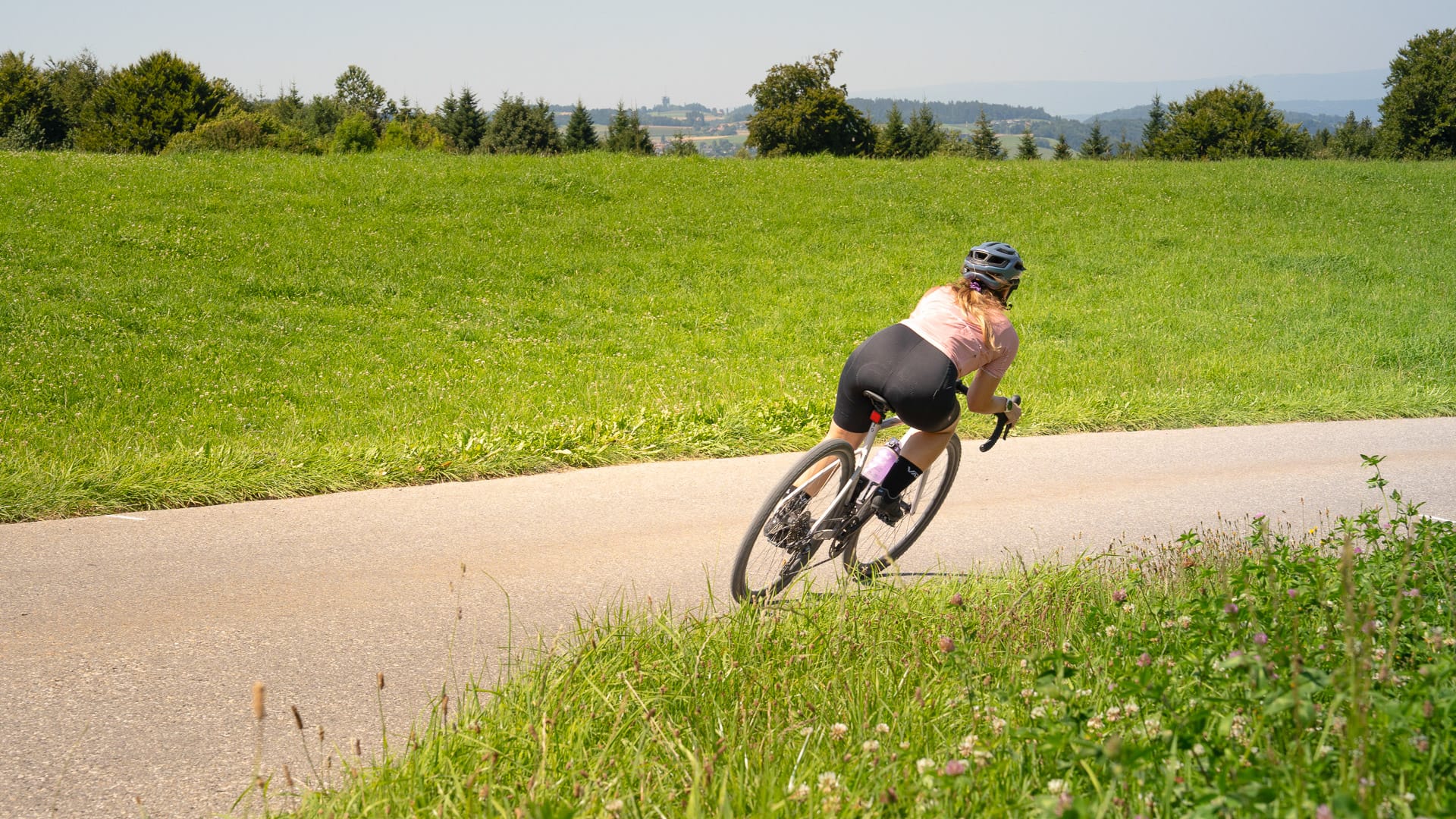 Gravel biking through open landscapes in the Bern region, Switzerland