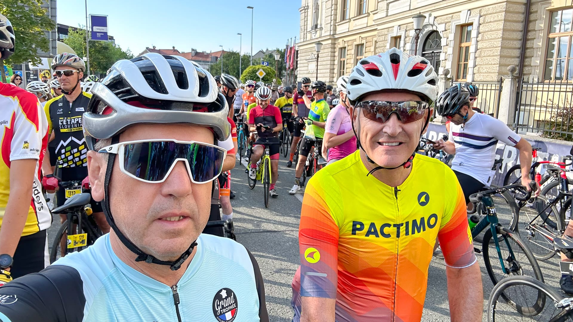 Cyclists pausing for a photo during L’Étape du Tour de France on the Slovenia course