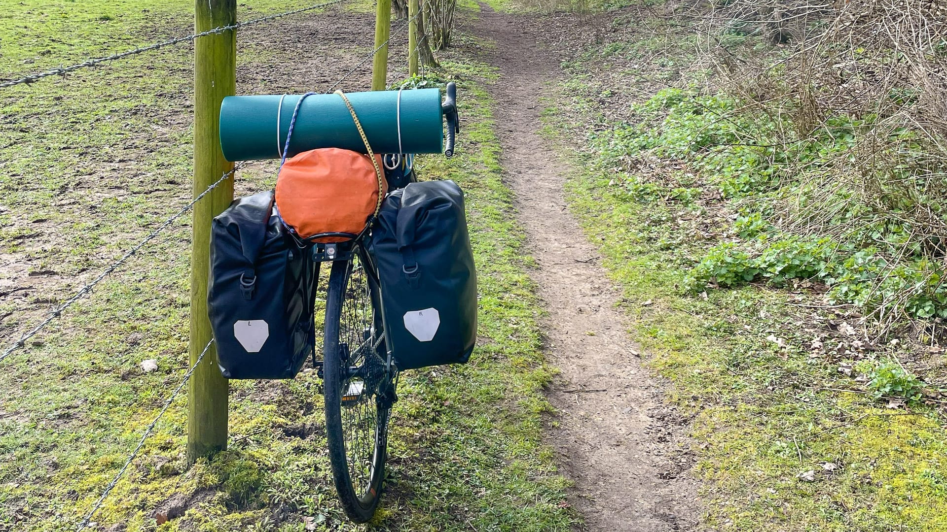 Bike parked on a quiet gravel road