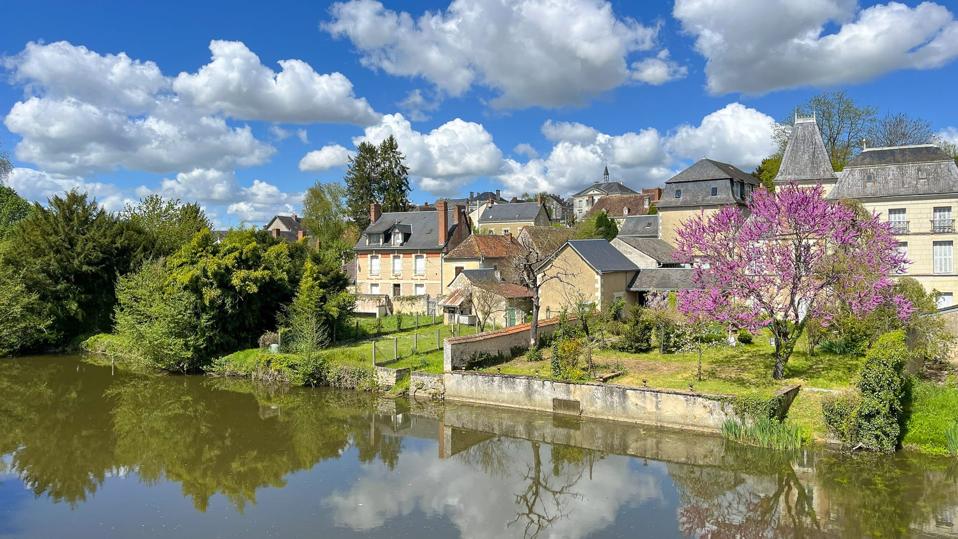 View of Preuilly-sur-la-Claise in France with historic buildings and riverside setting