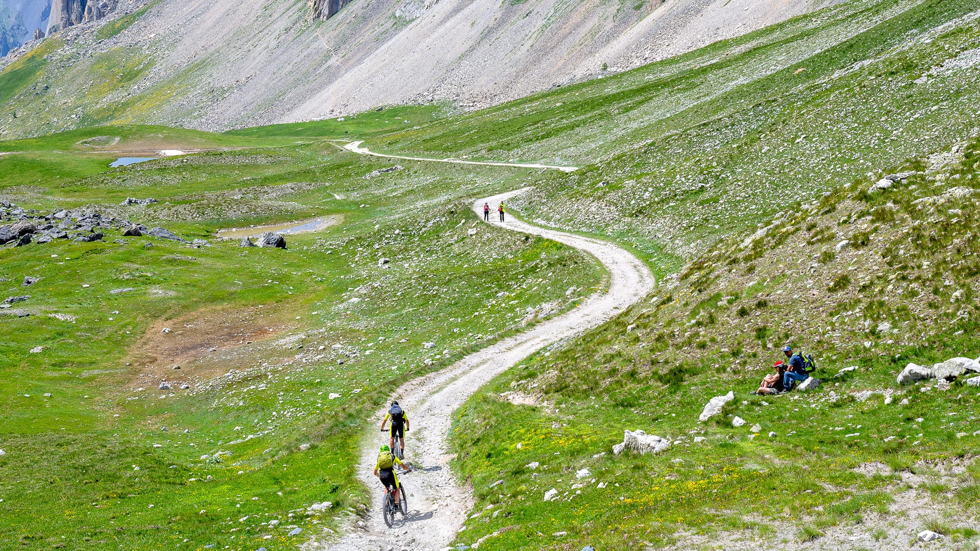 Two cyclists climbing on the Gardetta Plateau