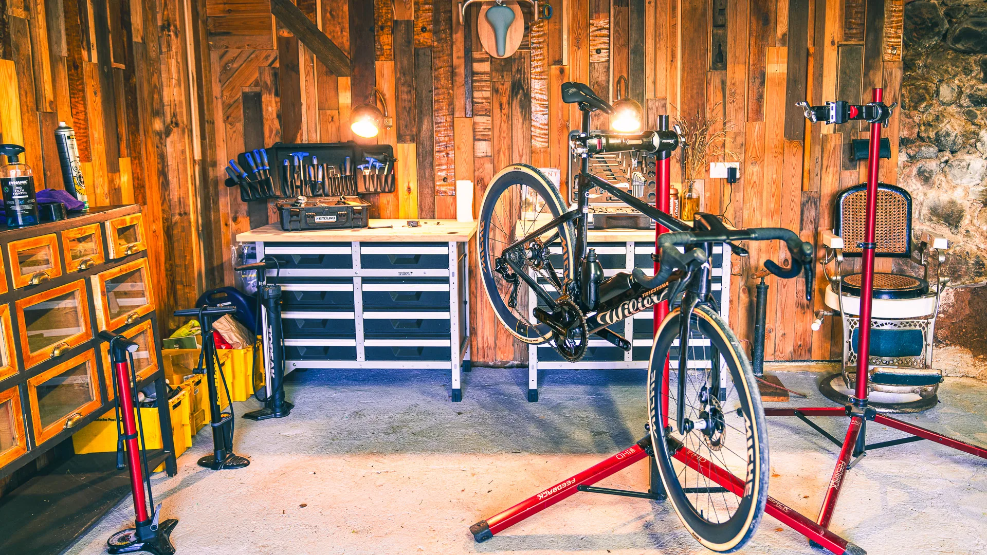 Spacious bike garage at Off Grid Girona hotel for secure bicycle storage
