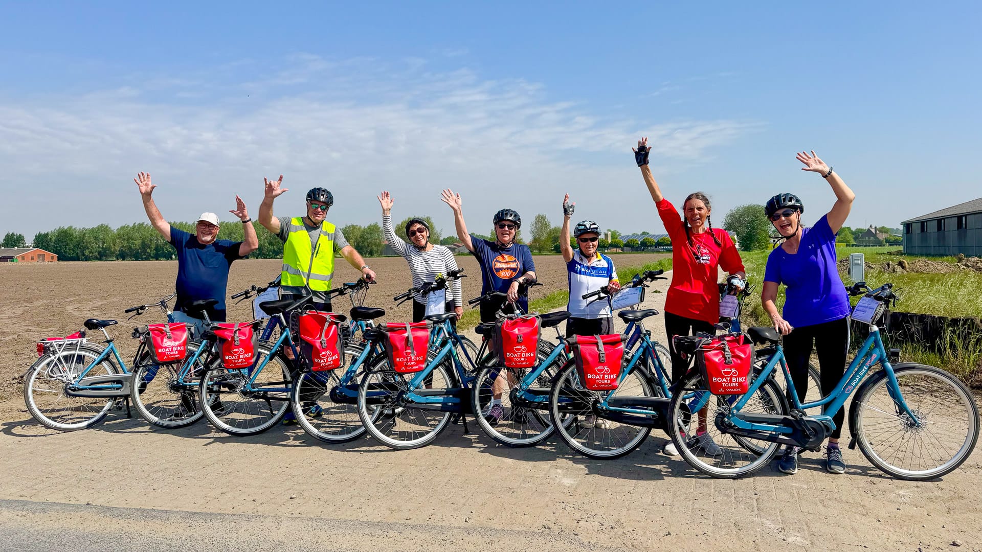 Cycle tourers riding between Amsterdam and Bruges on a premium cycling tour in the Netherlands and Belgium