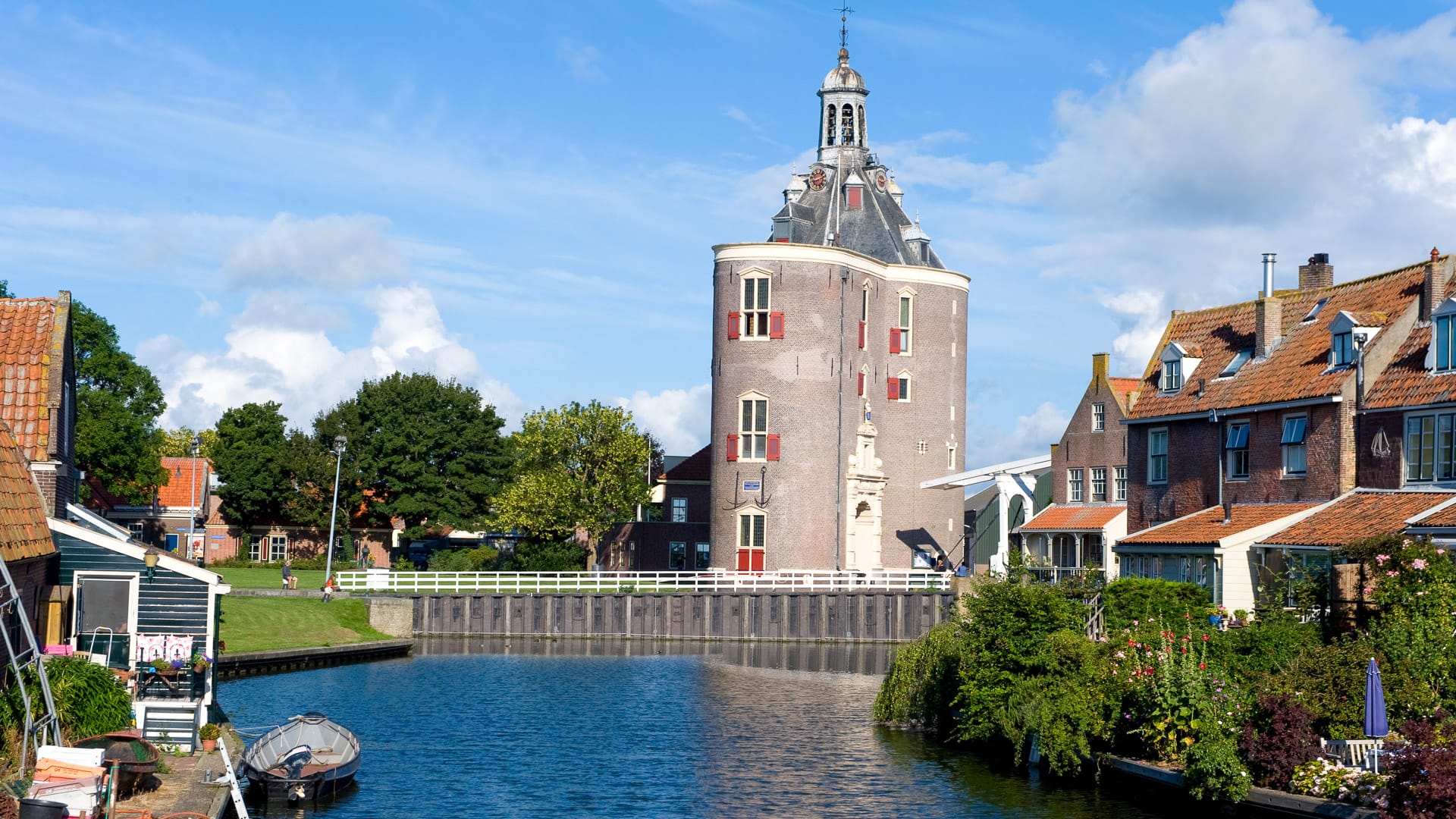 View of Enkhuizen in the Netherlands with harbour, boats and historic buildings