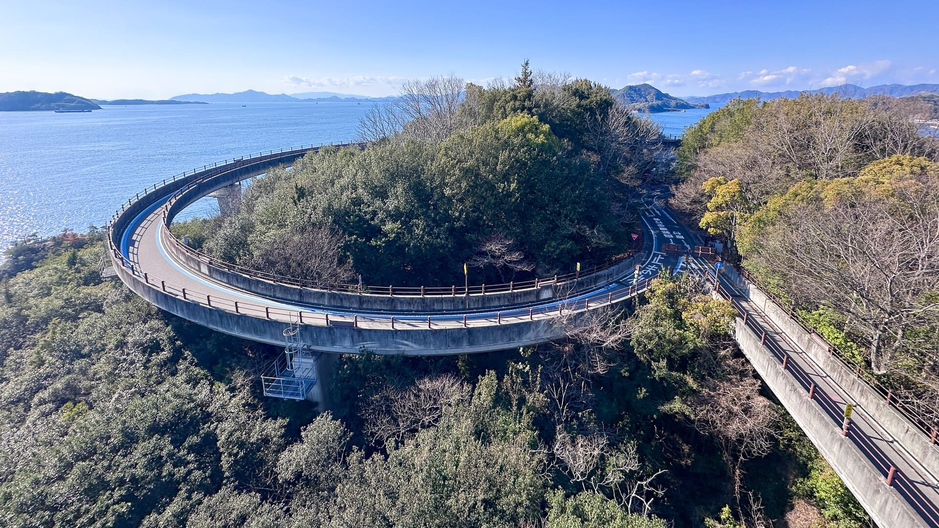 View of bike route onto Kurushima Kaikyo Bridges on the Shimanami Kaido, Japan