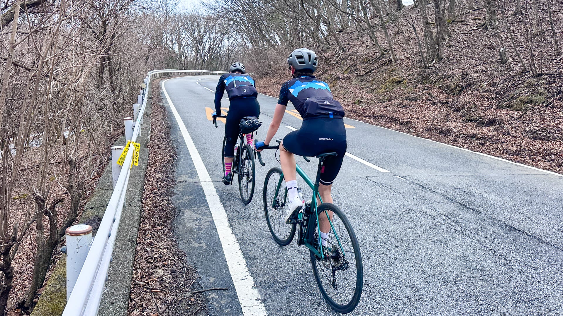 Cyclist climbing towards Lake Chuzenji in Japan on day two of the cycling tour