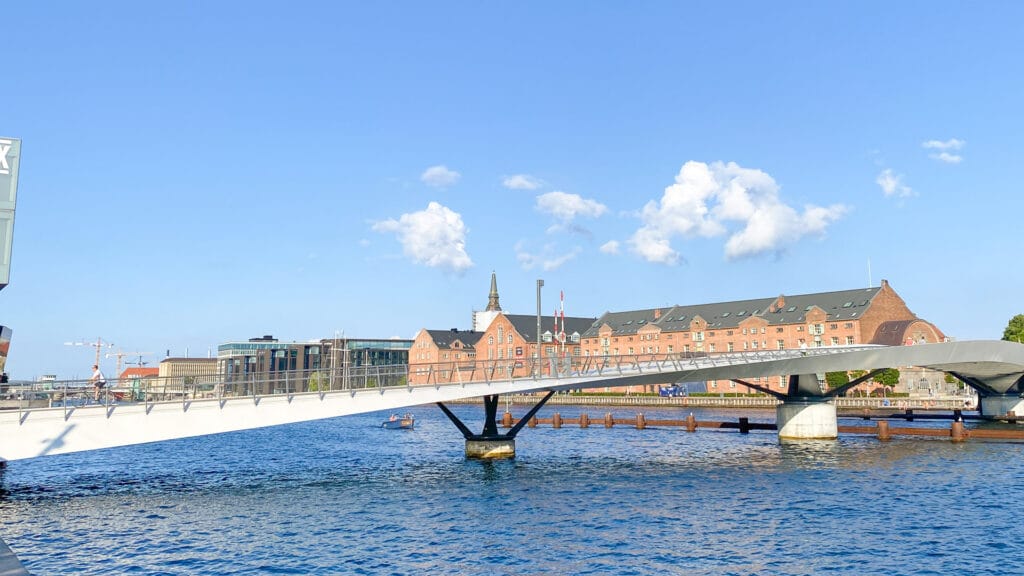 Cyclist on Lille Langebro bridge across the Inner Harbour in Copenhagen