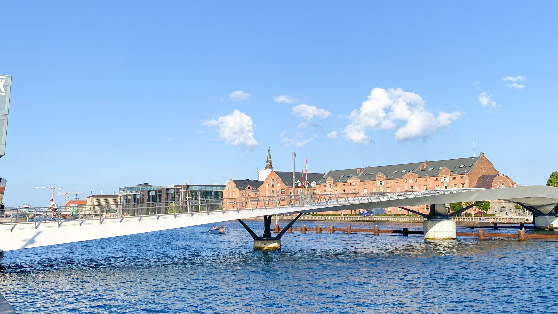 Cyclist on Lille Langebro bridge across the Inner Harbour in Copenhagen