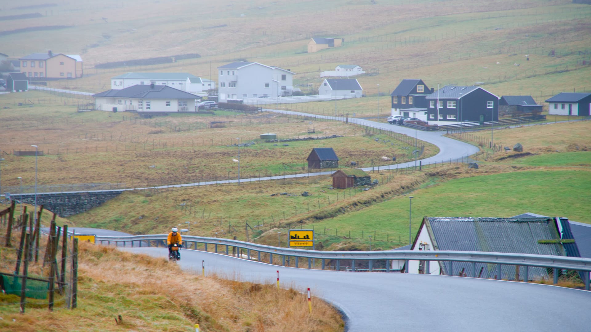 Cyclist at the end of the Viðareiði loop