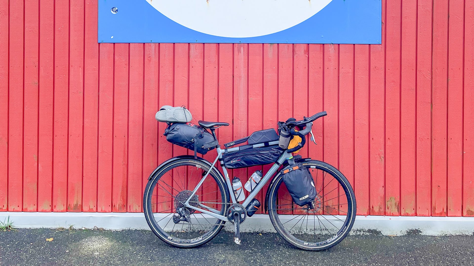 Bike parked in front of fk grocery stores