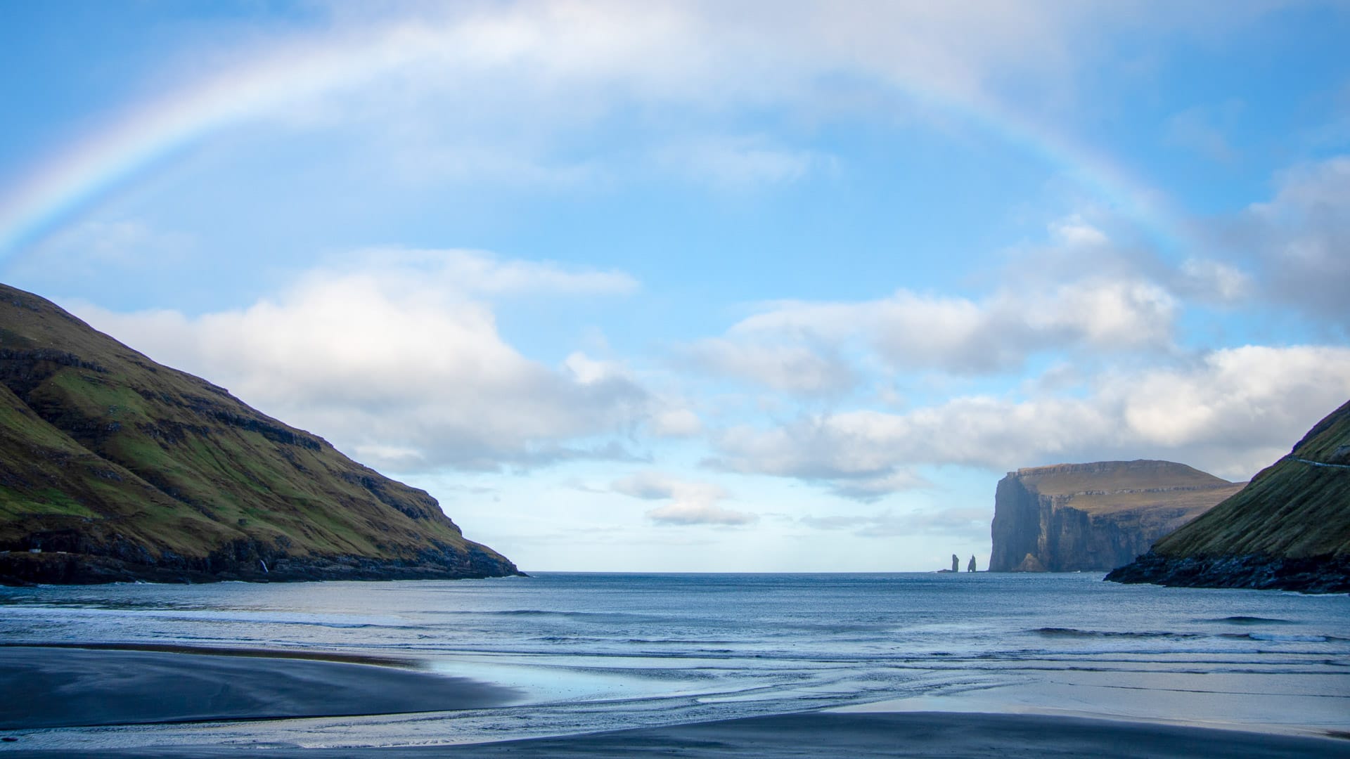 A rainbow over Tjørnuvík, northernmost village on Streymoy