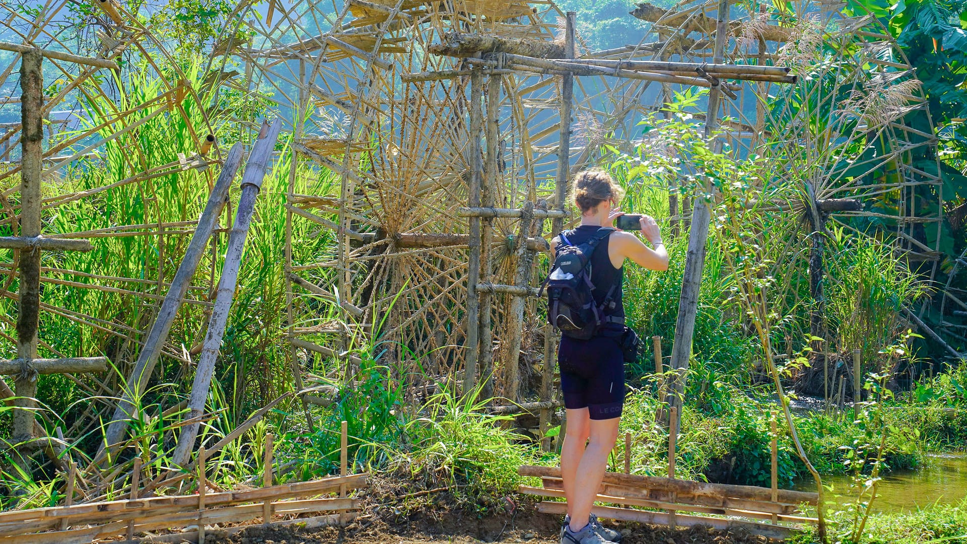 Cycling in Pu Luong Nature Reserve in northern Vietnam with green hills and rural scenery