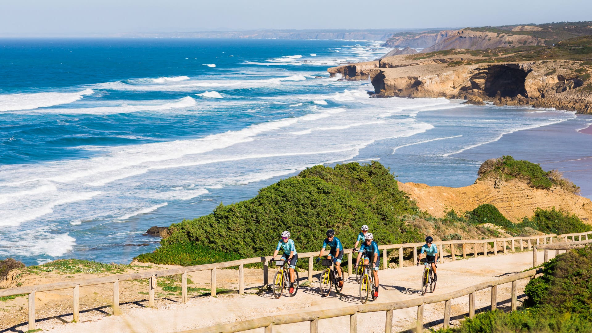 Gravel cyclists on Monte Clérigo roads along the Costa Vicentina and Atlantic southwest coast