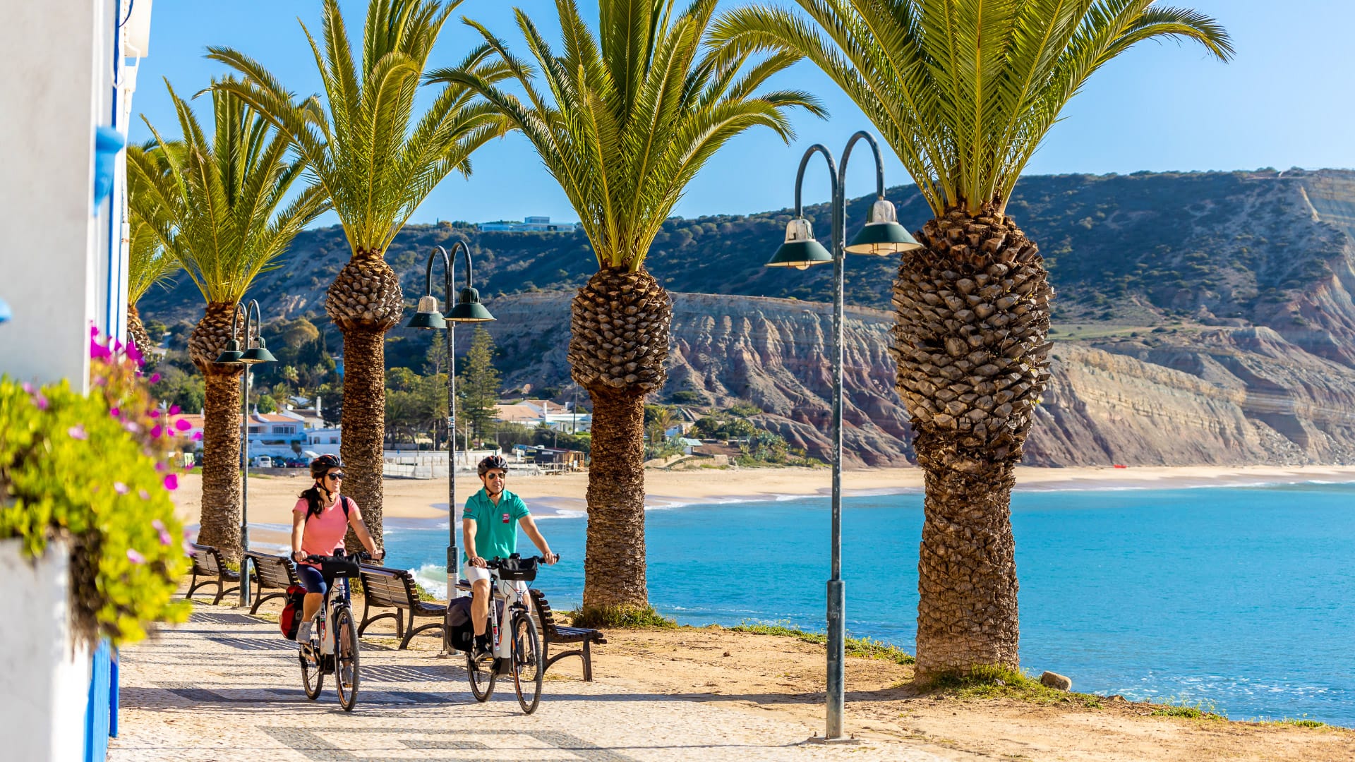 Cyclist on a coastal ride near Praia da Luz along the EuroVelo 1 route