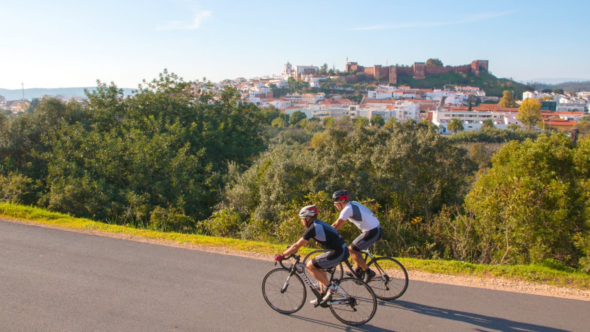 Cycling Across the Algarve trip arriving in Silves, with the medieval castle highlighted
