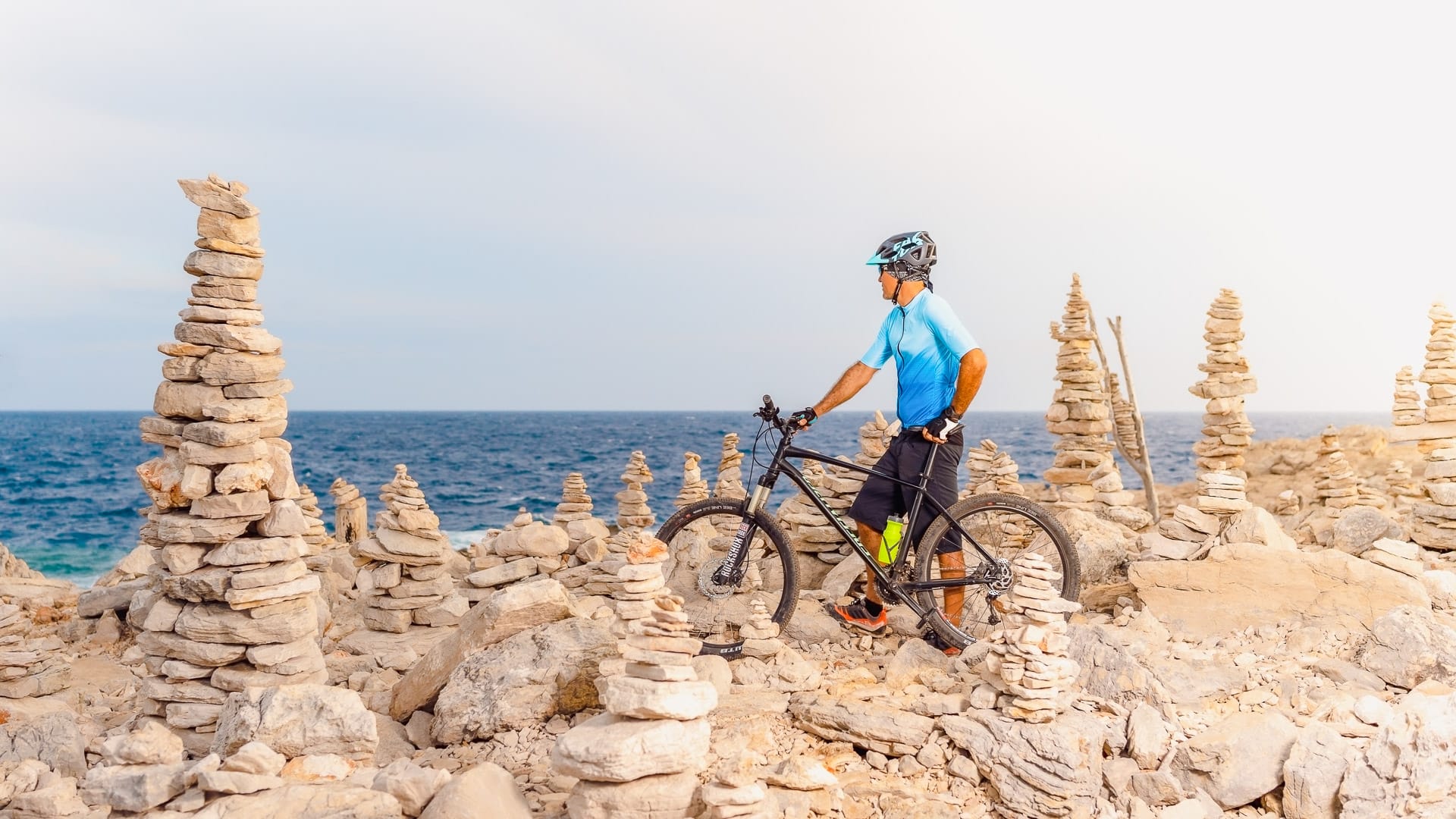 Man taking a photo while island cycling in the Zadar Region