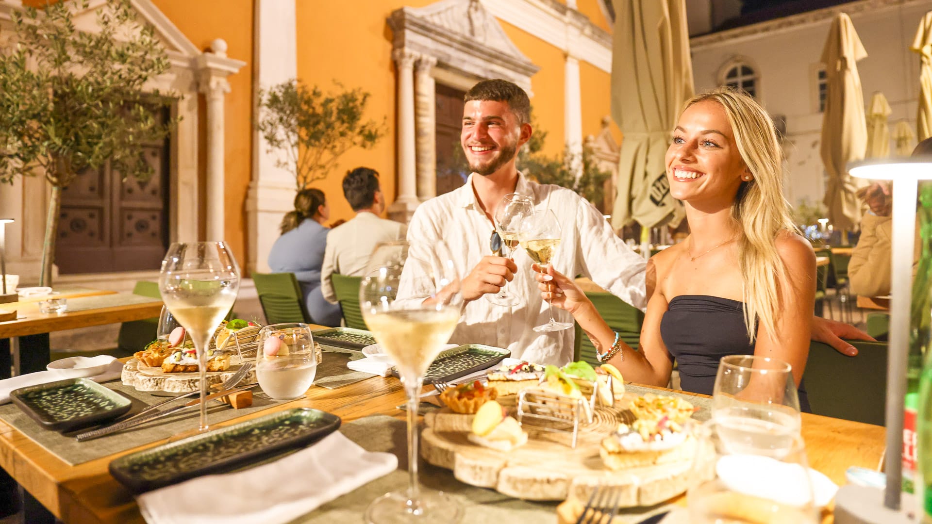 Tourists enjoying local food in Zadar County