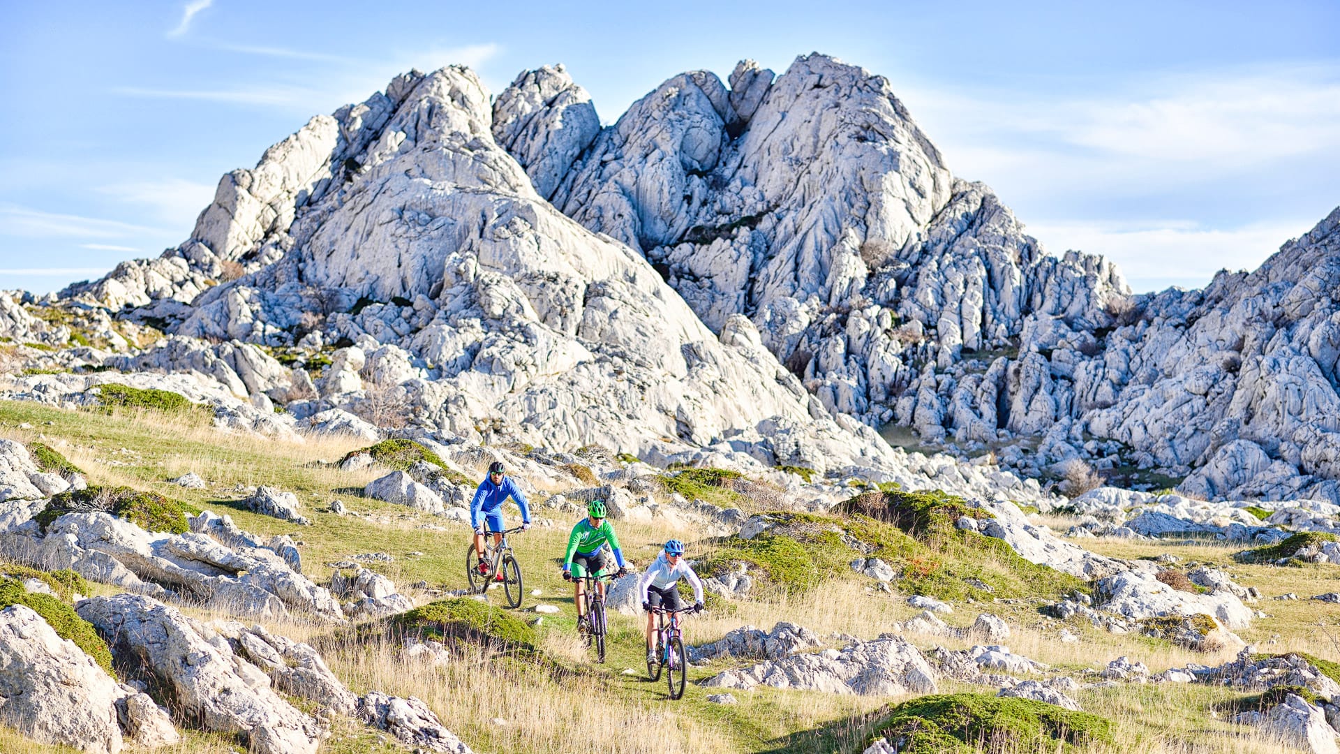 Cyclist climbing the Tulove Grede in the Velebit mountain range