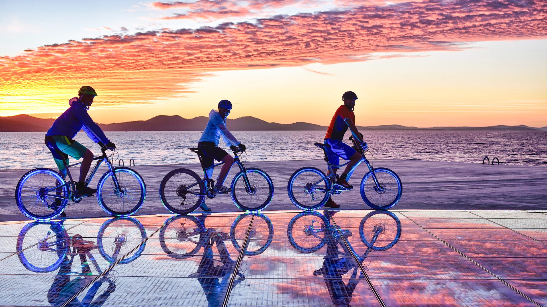 Riders cycling through Zadar at sunset is a unique feeling