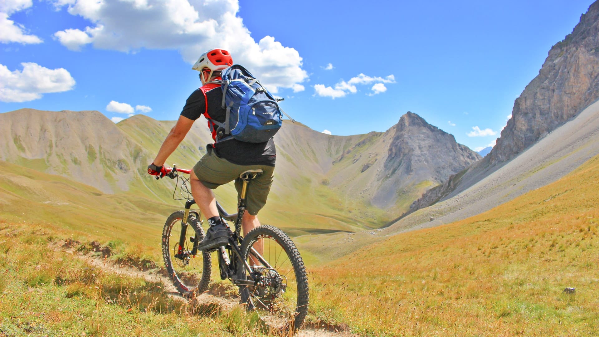 Cyclist enjoying the Mountain views and alpine scenery in Bardonecchia, Piemonte