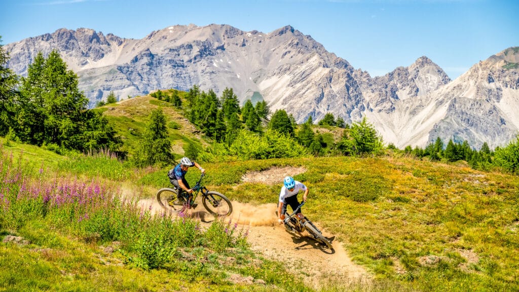 Cyclists tackling the Sauze d’Oulx mountain village in Piedmont