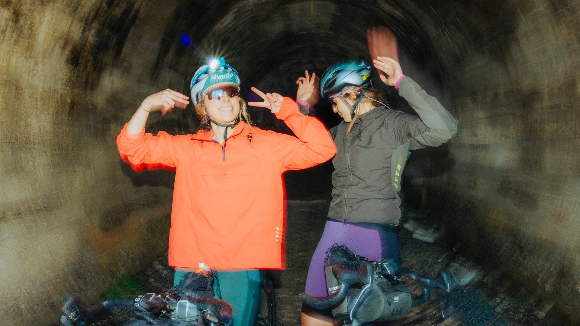 Cyclists on a tunnel along Strada Pramand, Piedmont