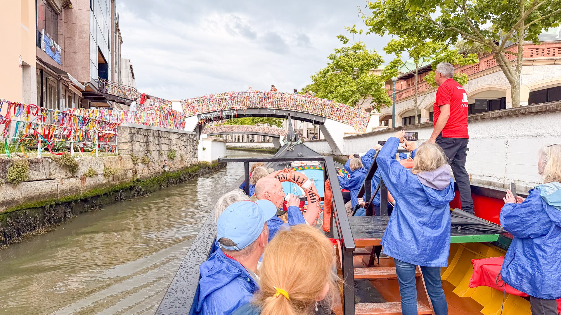 Cyclists taking a boat ride in Aveiro on the Porto to Lisbon cycle route