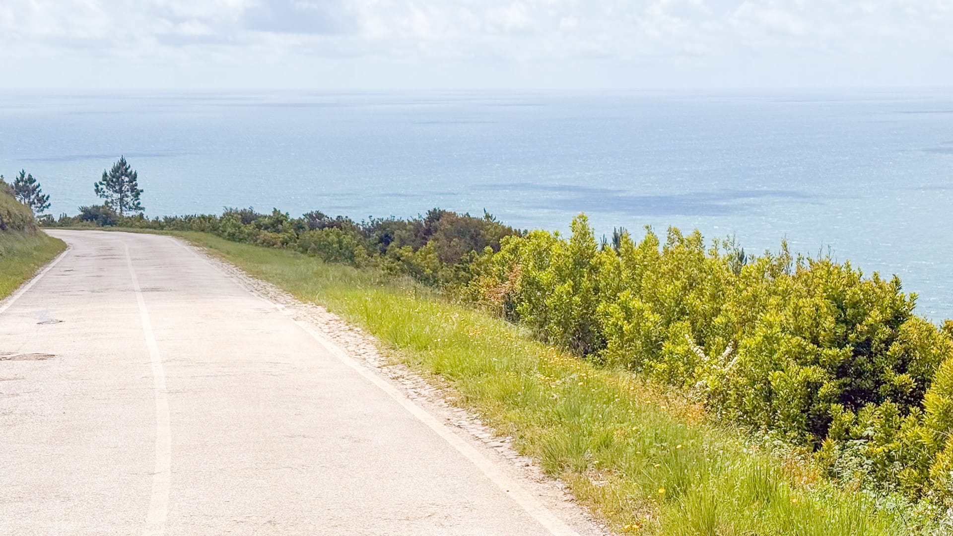 Cyclists stopping at a viewpoint on the Porto to Lisbon cycle route