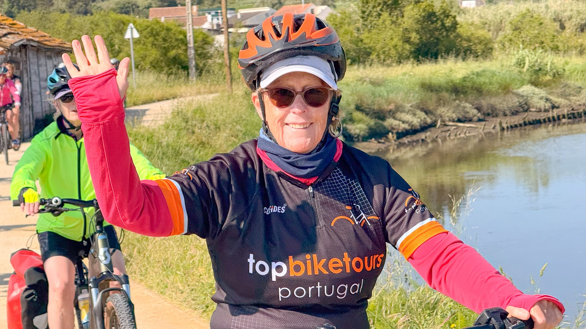 Cyclist on a riverside bike trail in rural northern Portugal