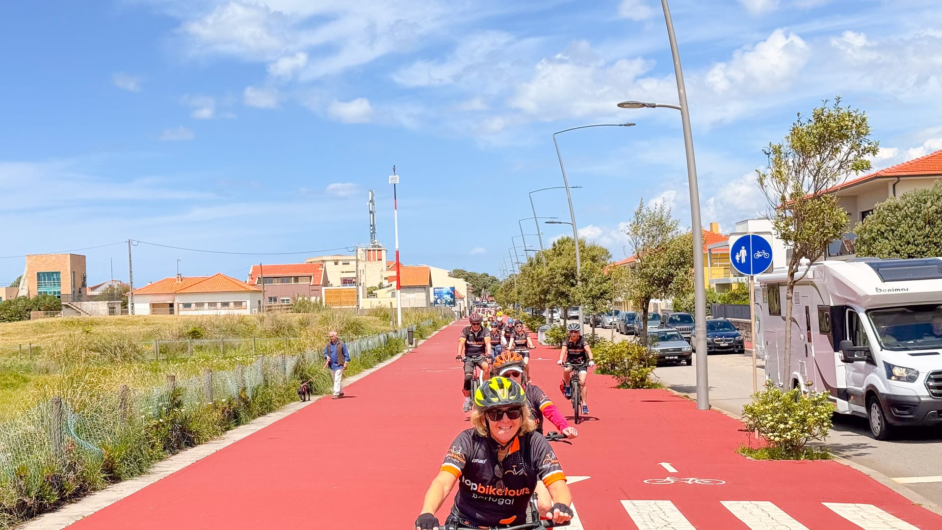Cyclists riding along a scenic cycling route in Portugal