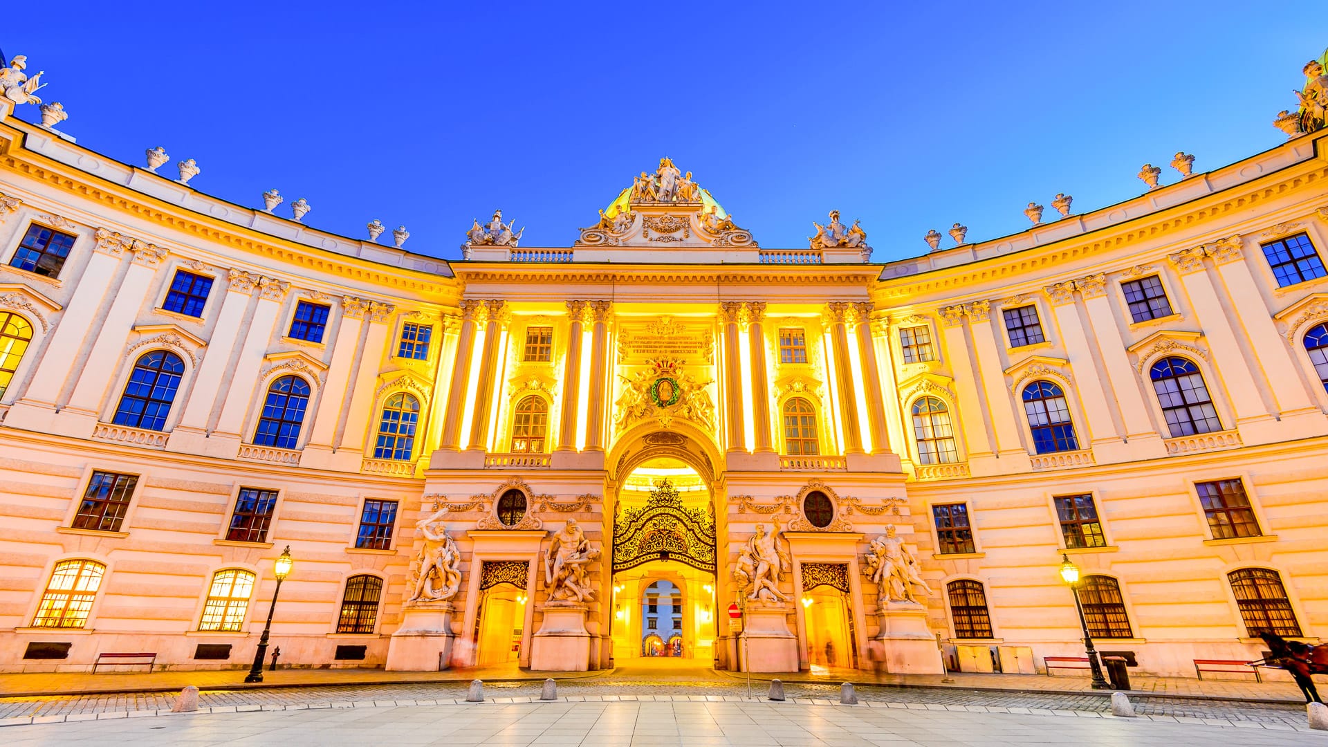 Hofburg Palace seen from Michaelerplatz at dusk, a Habsburg Empire landmark in Vienna, Austria