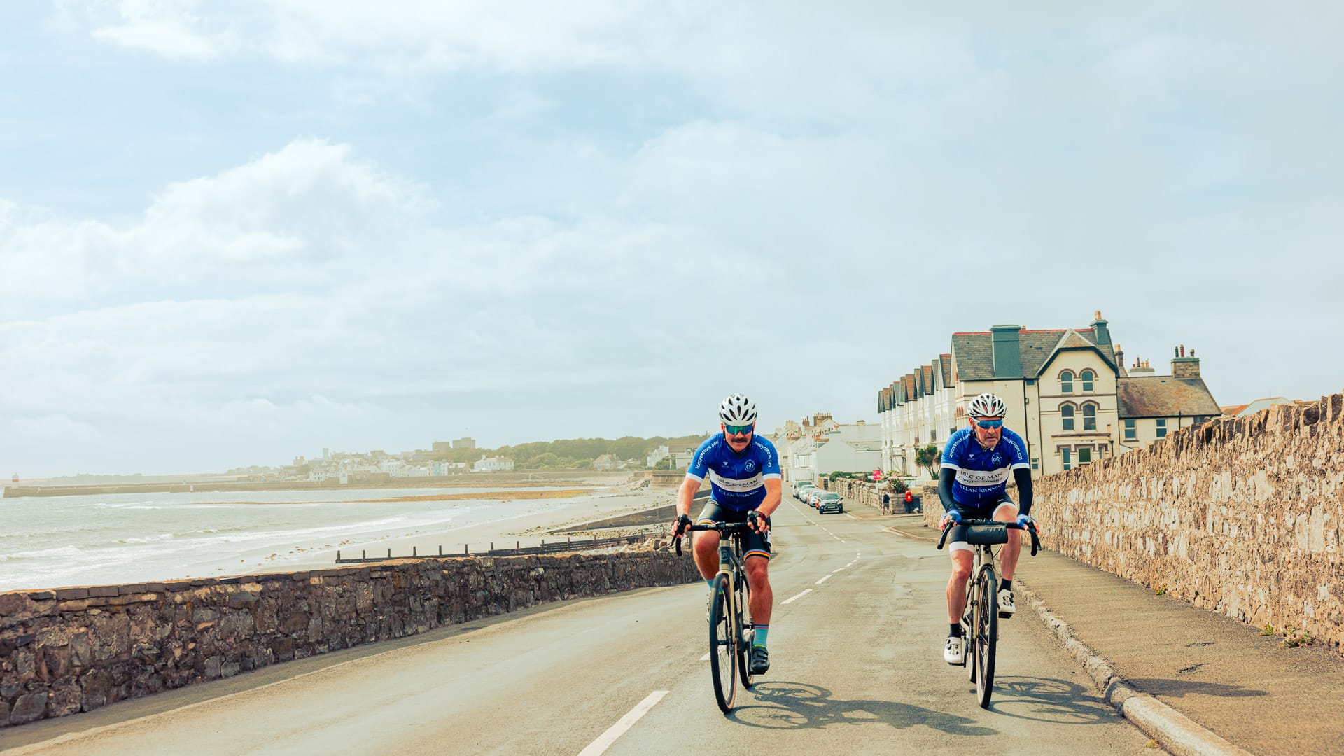 Cycling alongside Castletown Beach, in the south of the Island