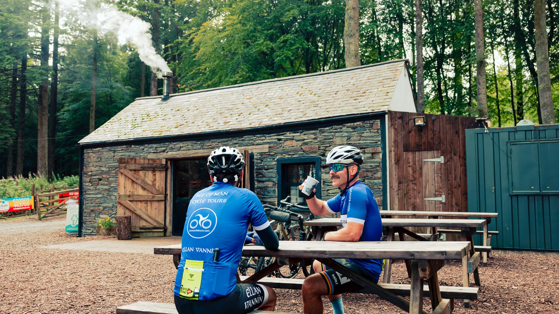 Cyclists enjoying a pit stop at The Coffee Cottage, located in South Barrule Plantation