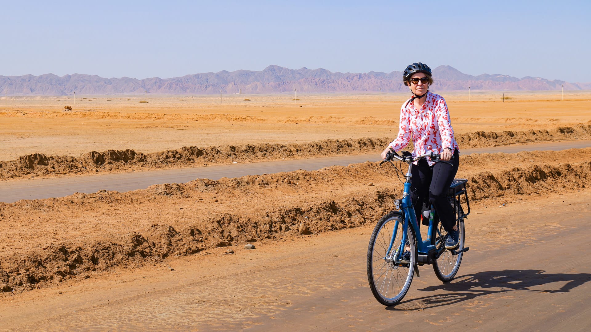 Cyclists riding through the Egyptian countryside on a Boat Bike Tours holiday