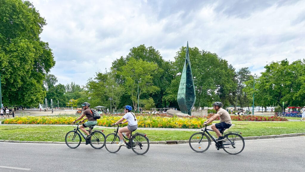 Group of cyclists riding on Margaret Island in Budapest