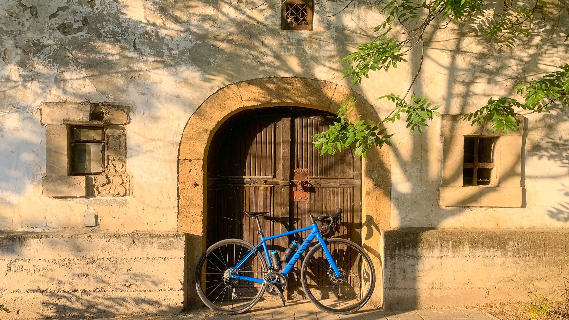 Bike parked in front of wine cellar in Etyek near Budapest