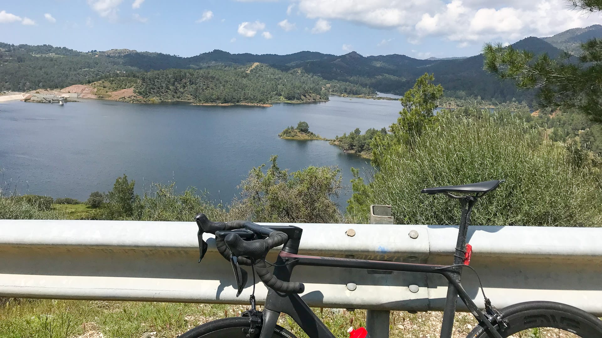 Road bike and lake, Cyprus