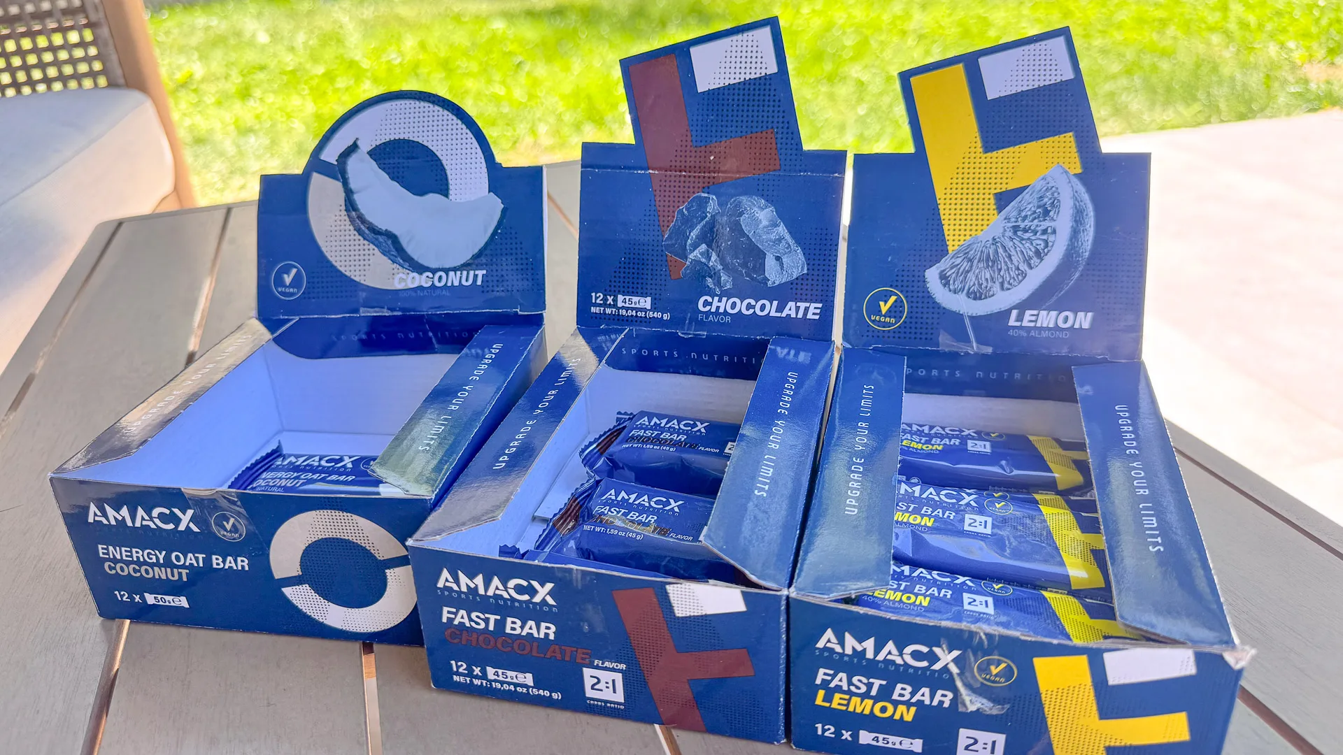 AMACX Fast Bar boxes in coconut, chocolate and lemon flavours