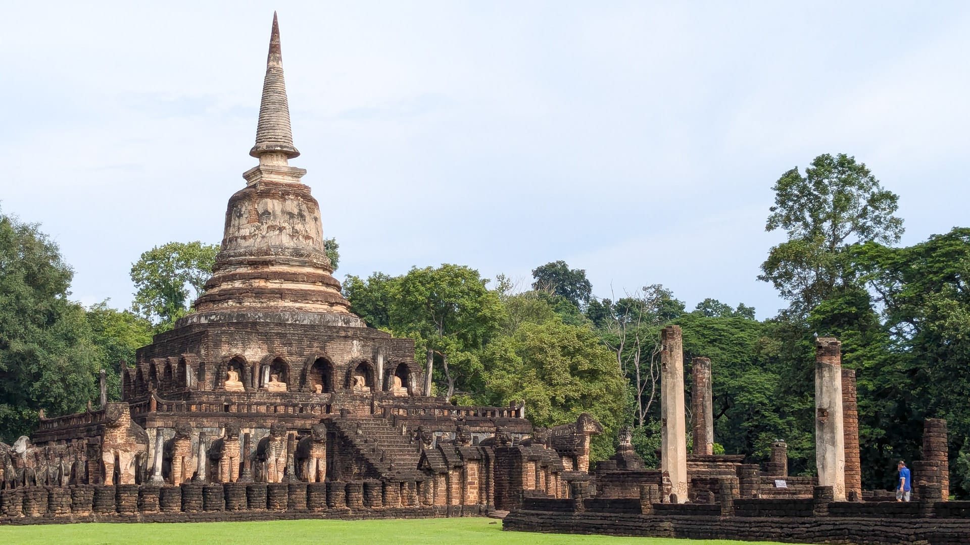 Cycling through the UNESCO World Heritage Site at Sukhothai, surrounded by historic temples and ruins