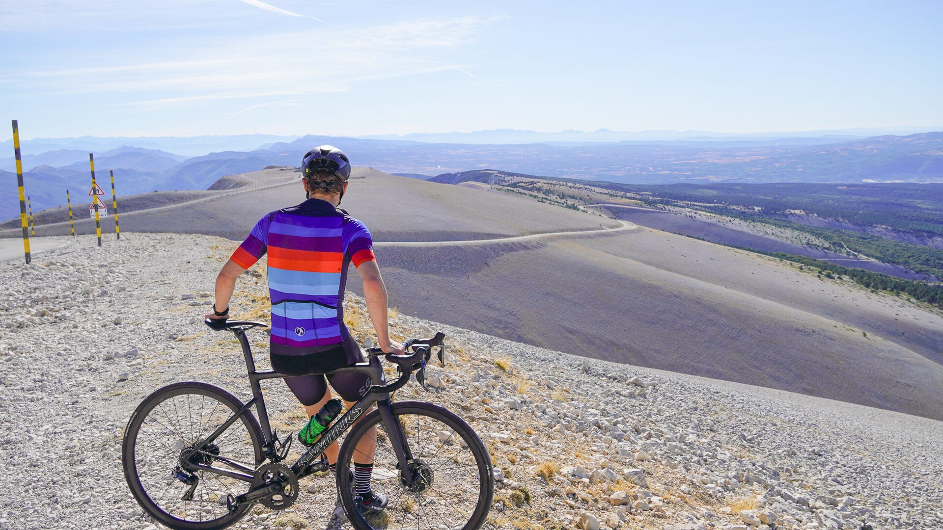 Cyclist admiring view on top of Mont Ventoux France