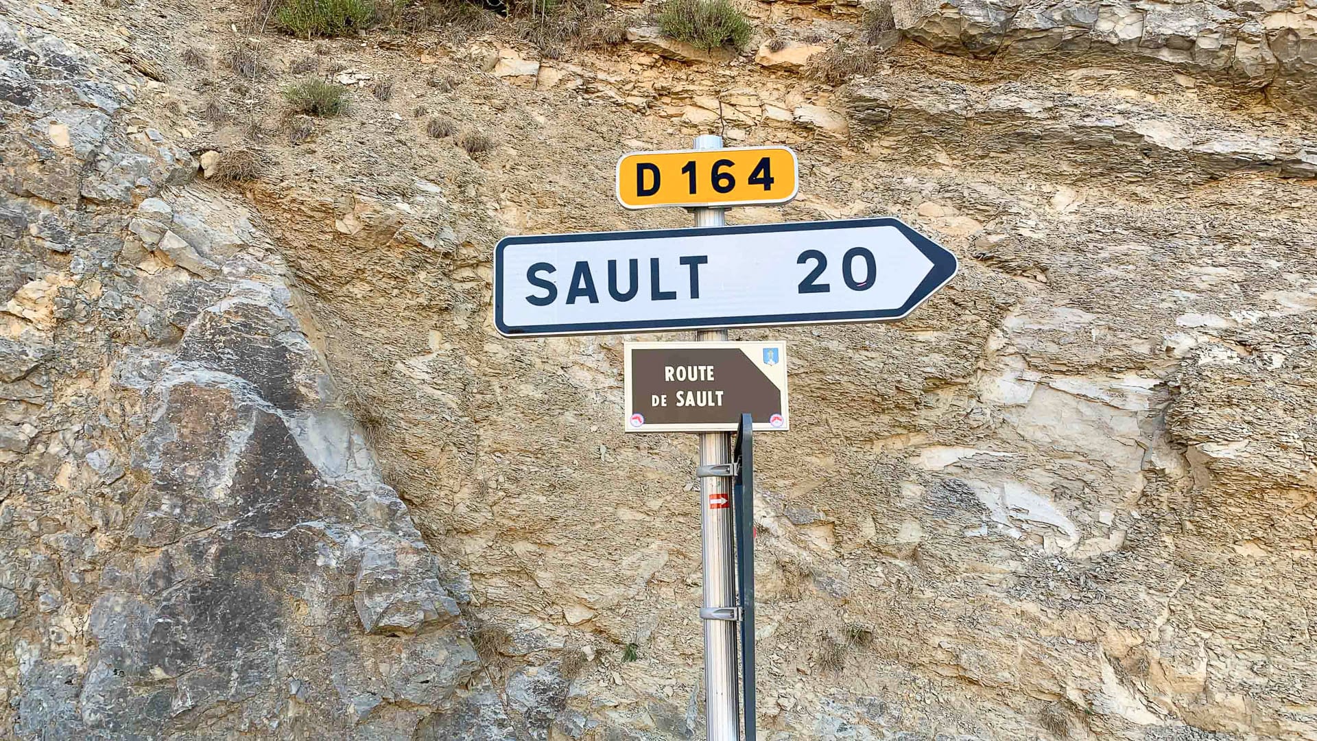Road sign pointing towards Sault on the D164