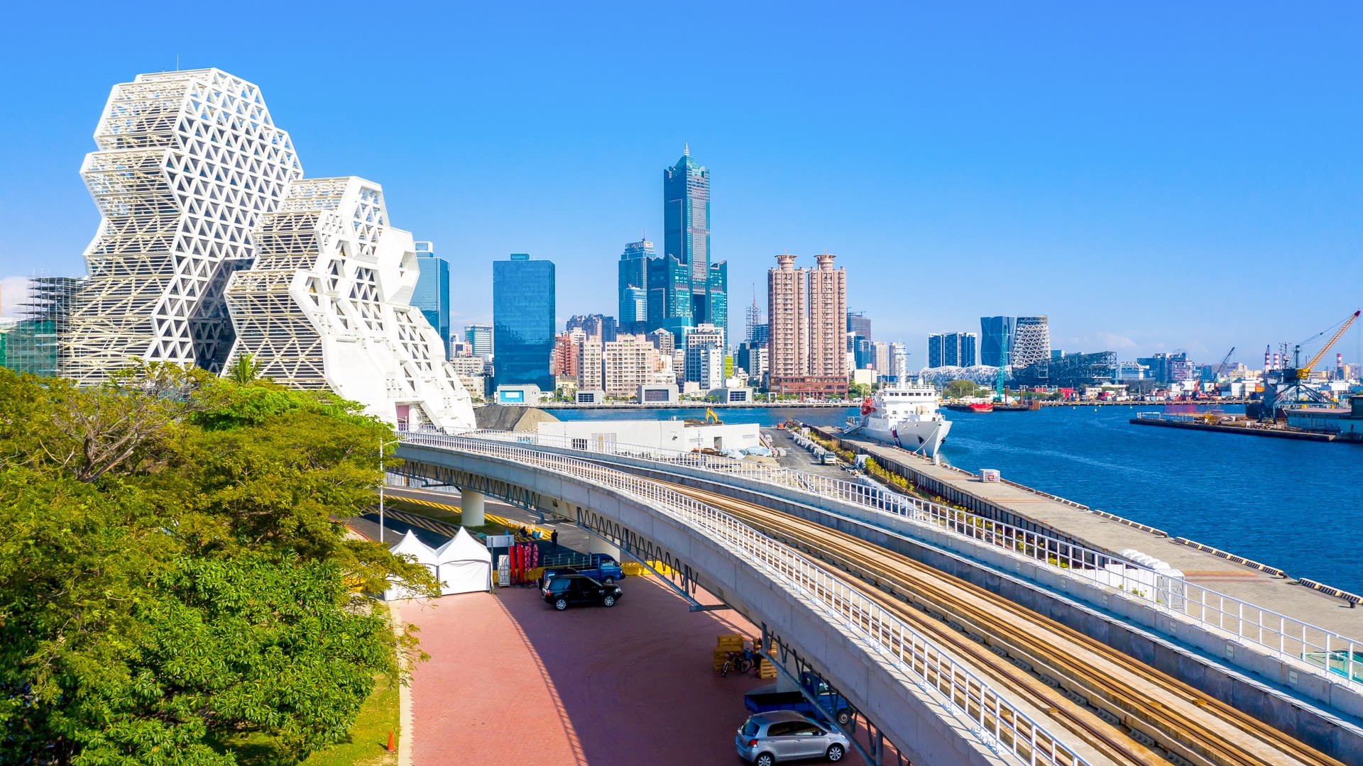Aerial view Kaohsiung city with blue sky background and Kaohsiung harbor, Taiwan.